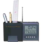 Pen holder with radio and calendar. LCD alarm clock
