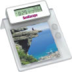 Multi function desktop photo frame with pen holder and alarm clock.